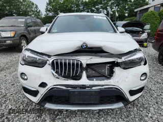2018 BMW X1 xDrive28i z VIN WBXHT3C36J5L24918, wystawiony jako Copart lot #62171365 z przebiegiem 23 446 mil mil oraz Szkoda całkowita • Salvage title. Historia ofert i sprzedaży dostępna na DreamBid. Obrazek 5.