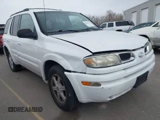 2003 Oldsmobile Bravada z VIN 1GHDT13S732260233, wystawiony jako IAAI lot #41897116 z przebiegiem 119 589 mil mil oraz . Historia ofert i sprzedaży dostępna na DreamBid. Obrazek 1.