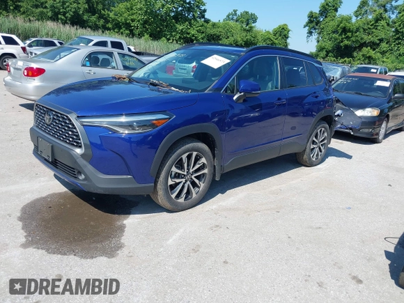 2022 Toyota Corolla Cross XLE z VIN 7MUDAABG4NV004836, wystawiony jako IAAI lot #42546573 z przebiegiem 23 821 mil mil oraz . Historia ofert i sprzedaży dostępna na DreamBid. Obrazek 19.