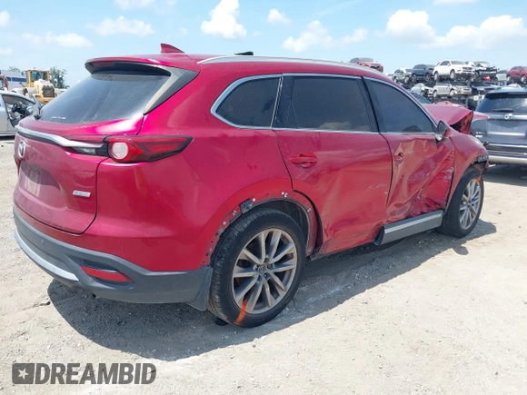 2019 Mazda CX-9 Grand Touring z VIN JM3TCADY5K0302436, wystawiony jako IAAI lot #42323545 z przebiegiem Nie podano mil oraz . Historia ofert i sprzedaży dostępna na DreamBid. Obrazek 4.