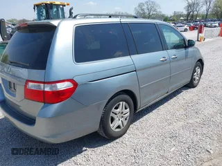 2007 Honda Odyssey EX with VIN 5FNRL38457B042912, listed as a IAAI auction lot 41992847 with 194,822 mi miles and . Bid and sale history available at DreamBid. Image 4.