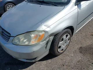 2003 Toyota Corolla CE with VIN 1NXBR32E23Z015648, listed as a IAAI auction lot 42056596 with 287,999 mi miles and . Bid and sale history available at DreamBid. Image 6.
