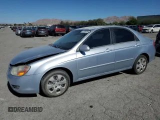 2008 Kia Spectra EX with VIN KNAFE121585543010, listed as a Copart auction lot 57180285 with 109,877 mi miles and Salvage title. Bid and sale history available at DreamBid. Image 1.