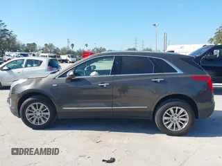 2019 Cadillac XT5 FWD with VIN 1GYKNARS5KZ143510, listed as a IAAI auction lot 41553279 with 53,943 mi miles and . Bid and sale history available at carsss.com. Image 14.