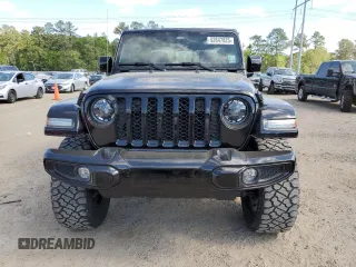 2023 Jeep Gladiator High Altitude z VIN 1C6HJTFG1PL591347, wystawiony jako Copart lot #52847825 z przebiegiem 9 854 mil mil oraz Szkoda całkowita • Salvage title. Historia ofert i sprzedaży dostępna na DreamBid. Obrazek 5.