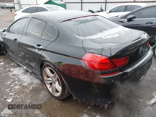 2015 BMW 6 Series 640i with VIN WBA6A0C55FGB53603, listed as a IAAI auction lot 41543996 with 71,046 mi miles and . Bid and sale history available at DreamBid. Image 3.