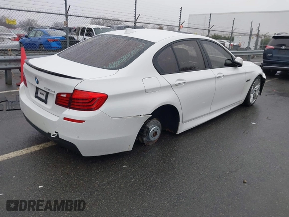 2014 BMW 5 Series 535d with VIN WBAXA5C58ED690612, listed as a IAAI auction lot 41570616 with 95,124 mi miles and . Bid and sale history available at carsss.com. Image 4.