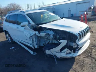 2018 Jeep Cherokee Overland with VIN 1C4PJMJX2JD569344, listed as a IAAI auction lot 41828276 with 94,309 mi miles. Bid and sale history available at carsss.com. Image 1.