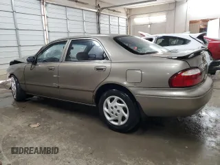 2000 Mazda 626 LX with VIN 1YVGF22C6Y5175233, listed as a Copart auction lot 42783225 with 167,704 mi miles and Salvage Title. Bid and sale history available at carsss.com. Image 2.