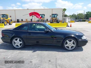2001 Mercedes-Benz SL-Class with VIN WDBFA68F71F196390, listed as a IAAI auction lot 42128119 with 65,010 mi miles. Bid and sale history available at carsss.com. Image 13.