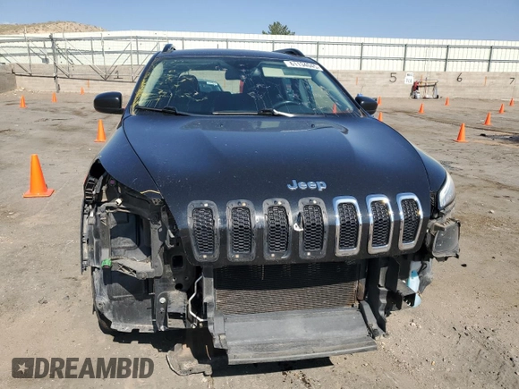2015 Jeep Cherokee Sport with VIN 1C4PJMAB7FW773265, listed as a Copart auction lot 61134045 with 117,628 mi miles and Salvage title. Bid and sale history available at DreamBid. Image 5.