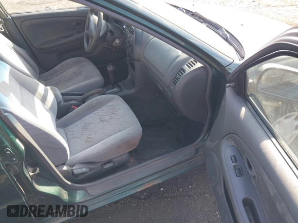 2001 Mitsubishi Mirage ES z VIN JA3AY26C91U041410, wystawiony jako IAAI lot #41360183 z przebiegiem 322 178 mil mil oraz . Historia ofert i sprzedaży dostępna na DreamBid. Obrazek 5.