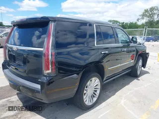 2015 Cadillac Escalade Platinum z VIN 1GYS4PKJ8FR568958, wystawiony jako IAAI lot #42316098 z przebiegiem 152 661 mil mil oraz . Historia ofert i sprzedaży dostępna na DreamBid. Obrazek 4.