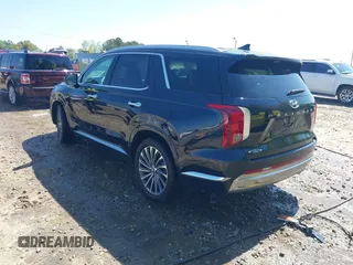 2023 Hyundai Palisade Calligraphy with VIN KM8R74GE6PU571342, listed as a IAAI auction lot 41987377 with 13,797 mi miles and . Bid and sale history available at DreamBid. Image 3.