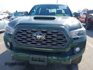 2021 Toyota Tacoma SR z VIN 3TMCZ5AN7MM395940, wystawiony jako IAAI lot #41860127 z przebiegiem 39 338 mil mil oraz . Historia ofert i sprzedaży dostępna na DreamBid. Obrazek 12.