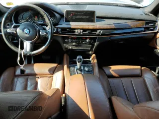 2015 BMW X6 xDrive50i with VIN 5UXKU6C50F0F94199, listed as a Copart auction lot 70680312 with 106,650 mi miles. Bid and sale history available at carsss.com. Image 8.