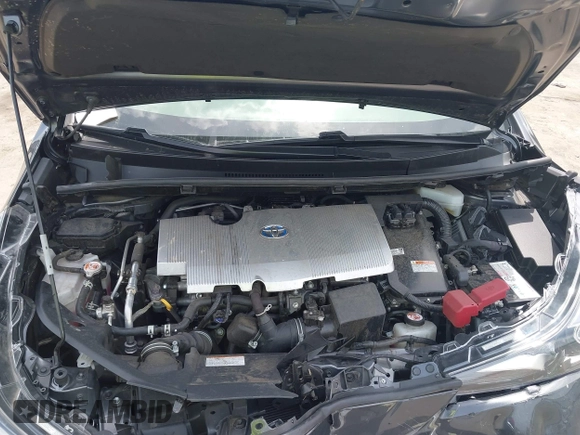 2021 Toyota Prius L Eco z VIN JTDKAMFU3M3152785, wystawiony jako IAAI lot #42501351 z przebiegiem 60 489 mil mil oraz . Historia ofert i sprzedaży dostępna na DreamBid. Obrazek 10.