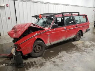 1990 Volvo 240 z VIN YV1AA8857L1869686, wystawiony jako Copart lot #52195465 z przebiegiem 139 312 mil mil oraz Tytuł czysty. Historia ofert i sprzedaży dostępna na DreamBid. Obrazek 1.
