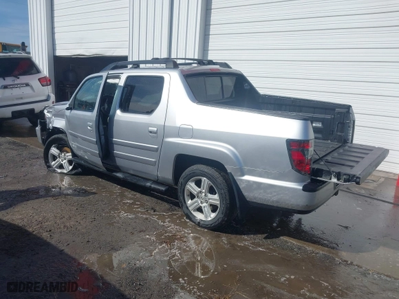 2014 Honda Ridgeline RTL with VIN 5FPYK1F51EB012843, listed as a IAAI auction lot 41629002 with 114,761 mi miles. Bid and sale history available at carsss.com. Image 3.