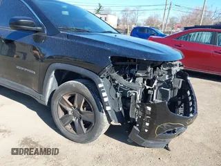 2022 Jeep Compass Latitude with VIN 3C4NJDBB4NT134481, listed as a IAAI auction lot 41973387 with 97,533 mi miles and . Bid and sale history available at DreamBid. Image 21.