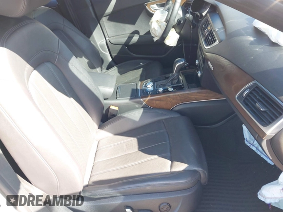 2016 Audi A7 3.0 Prestige with VIN WAU2GAFC6GN157778, listed as a IAAI auction lot 41836901 with 77,143 mi miles. Bid and sale history available at carsss.com. Image 5.