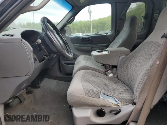2000 Ford F-150 XL with VIN 1FTRX18W0YNC08668, listed as a Copart auction lot 53636035 with 0 mi miles and Salvage Title. Bid and sale history available at carsss.com. Image 7.