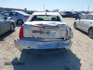 2009 Cadillac CTS AWD w/1SA with VIN 1G6DH577190106497, listed as a IAAI auction lot 41754632 with 86,392 mi miles. Bid and sale history available at carsss.com. Image 6.