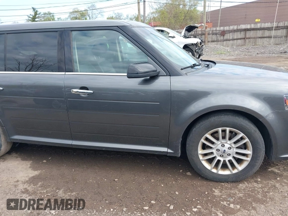 2016 Ford Flex SEL z VIN 2FMGK5C82GBA21945, wystawiony jako IAAI lot #42206498 z przebiegiem 141 320 mil mil oraz . Historia ofert i sprzedaży dostępna na DreamBid. Obrazek 13.