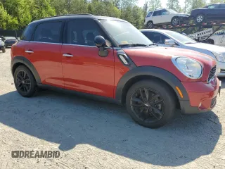 2014 MINI Countryman S with VIN WMWZC3C54EWP25321, listed as a Copart auction lot 54898515 with 48,530 mi miles and Salvage Title. Bid and sale history available at DreamBid. Image 4.