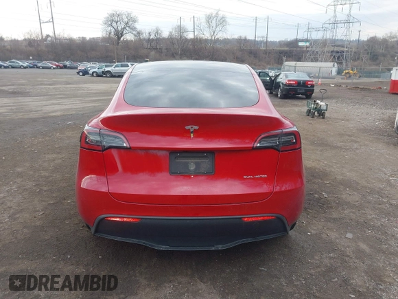 2022 Tesla Model Y Long Range with VIN 7SAYGDEE1NF442159, listed as a IAAI auction lot 41674506 with 82,355 mi miles and . Bid and sale history available at DreamBid. Image 16.