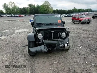 2018 Jeep Wrangler Sahara with VIN 1C4AJWBG2JL852087, listed as a Copart auction lot 54380935 with 49,287 mi miles and Salvage title. Bid and sale history available at DreamBid. Image 15.