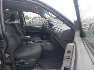 2003 Jeep Grand Cherokee Laredo with VIN 1J4GW48NX3C532874, listed as a IAAI auction lot 42613091 with 165,920 mi miles and . Bid and sale history available at DreamBid. Image 5.