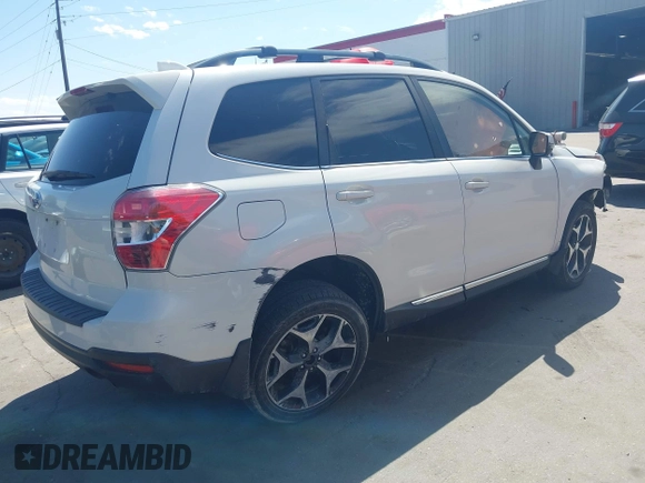 2016 Subaru Forester XT Touring with VIN JF2SJGXC5GH456474, listed as a IAAI auction lot 42320208 with 114,524 mi miles and . Bid and sale history available at DreamBid. Image 4.