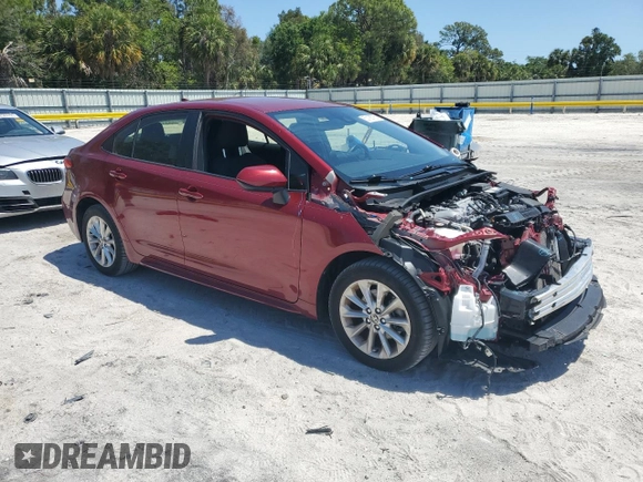 2022 Toyota Corolla LE with VIN JTDVPMAE4NJ221959, listed as a Copart auction lot 52168765 with 40,324 mi miles and Salvage Title. Bid and sale history available at DreamBid. Image 4.