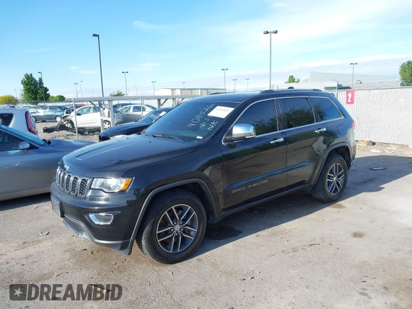 2018 Jeep Grand Cherokee Limited with VIN 1C4RJFBT7JC408526, listed as a IAAI auction lot 42103419 with 103,873 mi miles and . Bid and sale history available at DreamBid. Image 2.