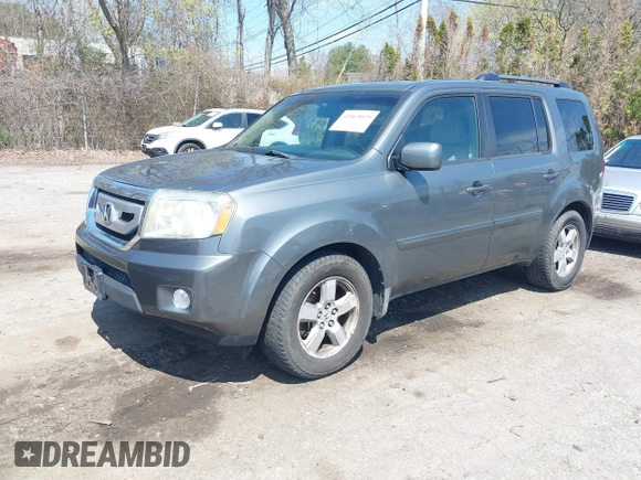 2009 Honda Pilot EX-L with VIN 5FNYF48649B018548, listed as a IAAI auction lot 42069029 with 198,098 mi miles and . Bid and sale history available at carsss.com. Image 2.
