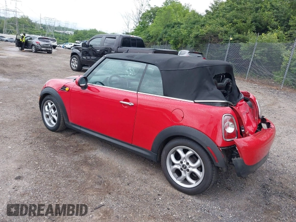 2011 MINI Convertible with VIN WMWZN3C59BTZ89447, listed as a IAAI auction lot 42313009 with 62,009 mi miles and . Bid and sale history available at DreamBid. Image 3.