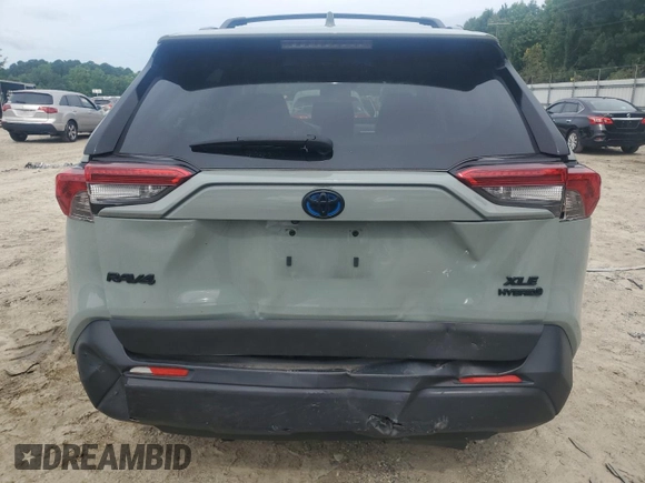 2023 Toyota RAV4 Hybrid XLE Premium with VIN JTMB6RFV8PD097109, listed as a Copart auction lot 59970995 with 43,197 mi miles and Salvage title. Bid and sale history available at DreamBid. Image 6.