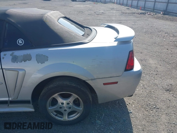 2002 Ford Mustang Deluxe with VIN 1FAFP44432F205991, listed as a IAAI auction lot 42144709 with 138,119 mi miles and . Bid and sale history available at DreamBid. Image 14.
