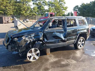 2016 Jeep Patriot High Altitude Edition with VIN 1C4NJRFB9GD585910, listed as a IAAI auction lot 40204837 with 122,415 mi miles. Bid and sale history available at carsss.com. Image 2.
