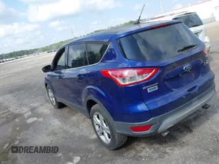 2014 Ford Escape SE z VIN 1FMCU9G91EUA06332, wystawiony jako IAAI lot #42727426 z przebiegiem 173 713 mil mil oraz . Historia ofert i sprzedaży dostępna na DreamBid. Obrazek 3.
