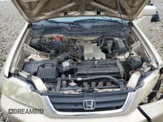2001 Honda CR-V SE z VIN JHLRD18731C005795, wystawiony jako Copart lot #52156415 z przebiegiem 310 677 mil mil oraz Szkoda całkowita • Salvage title. Historia ofert i sprzedaży dostępna na DreamBid. Obrazek 12.