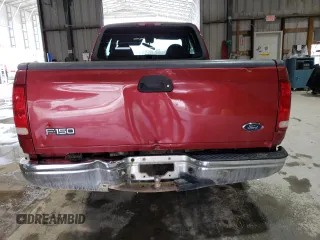 2000 Ford F-150 XL with VIN 1FTZX1720YKB22051, listed as a Copart auction lot 88255005 with 243,759 mi miles and Salvage Title. Bid and sale history available at carsss.com. Image 6.