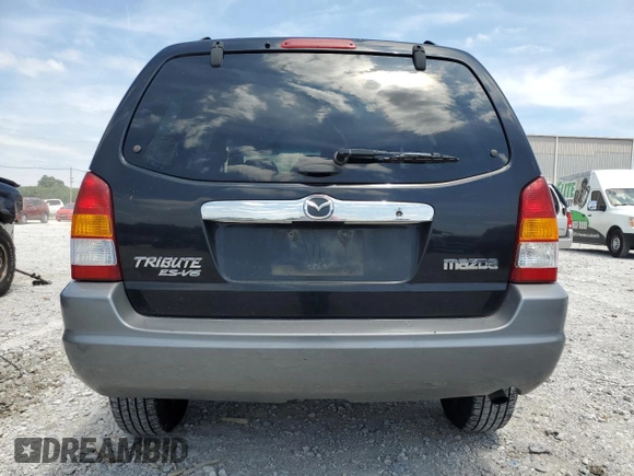 2002 Mazda Tribute LX with VIN 4F2YU09182KM12760, listed as a Copart auction lot 61292724 with 226,479 mi miles and Salvage Title. Bid and sale history available at carsss.com. Image 6.