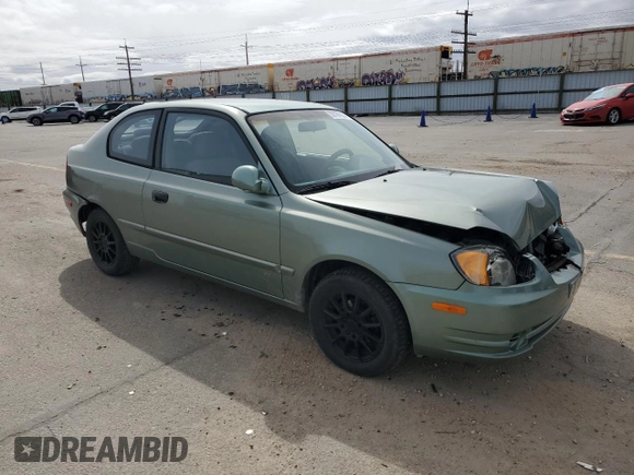 2003 Hyundai Accent GL with VIN KMHCG35C13U270585, listed as a Copart auction lot 50197935 with 53,822 mi miles and Salvage Title. Bid and sale history available at carsss.com. Image 4.