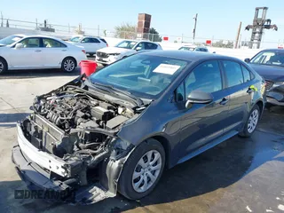2023 Toyota Corolla LE with VIN 5YFB4MDE5PP014910, listed as a IAAI auction lot 41860905 with 40,517 mi miles. Bid and sale history available at carsss.com. Image 2.