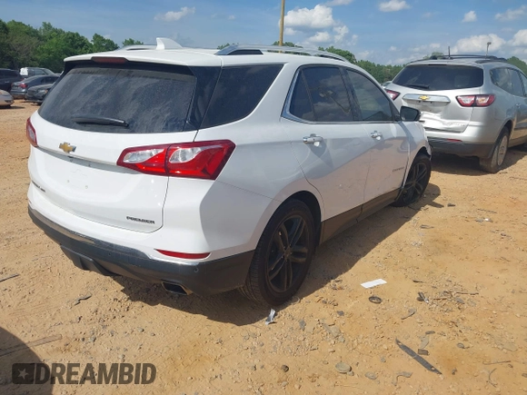 2019 Chevrolet Equinox Premier z VIN 2GNAXPEX9K6177386, wystawiony jako IAAI lot #42172103 z przebiegiem 61 045 mil mil oraz . Historia ofert i sprzedaży dostępna na DreamBid. Obrazek 4.