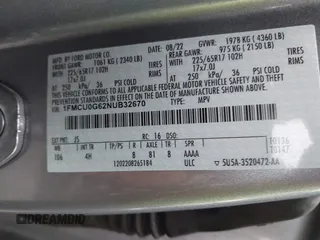2022 Ford Escape SE z VIN 1FMCU0G62NUB32670, wystawiony jako IAAI lot #42259177 z przebiegiem 67 692 mil mil oraz . Historia ofert i sprzedaży dostępna na DreamBid. Obrazek 9.