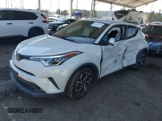2018 Toyota C-HR XLE with VIN NMTKHMBX9JR022921, listed as a IAAI auction lot 41858651 with 50,448 mi miles. Bid and sale history available at carsss.com. Image 16.