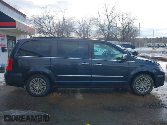 2014 Chrysler Town & Country Touring-L with VIN 2C4RC1CG4ER330072, listed as a IAAI auction lot 41533640 with 131,253 mi miles. Bid and sale history available at carsss.com. Image 13.